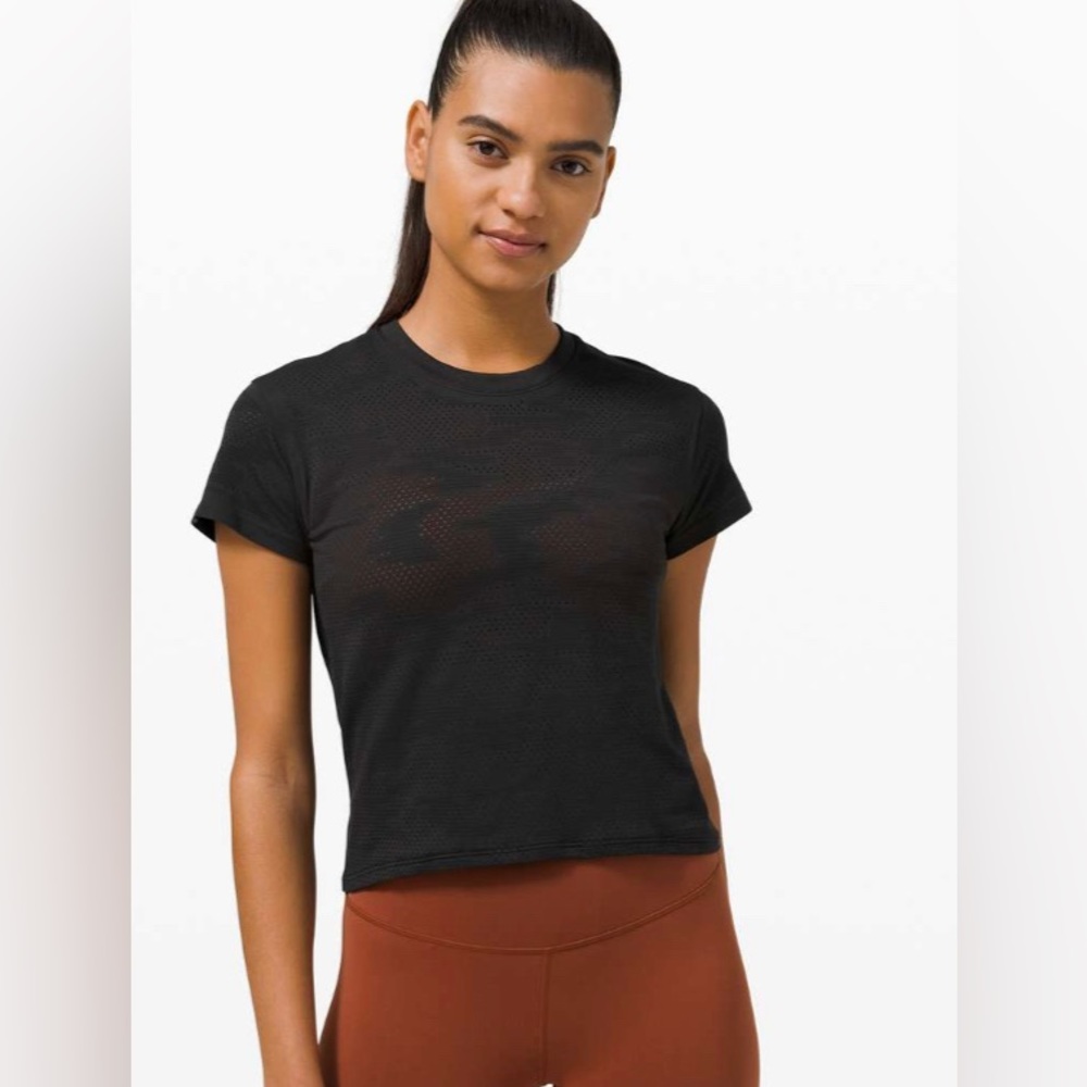 See threw black camo shirt